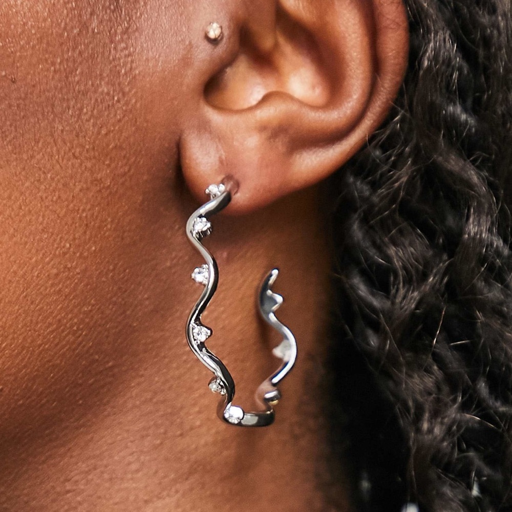 Reclaimed Vintage warped hoop earrings in silver